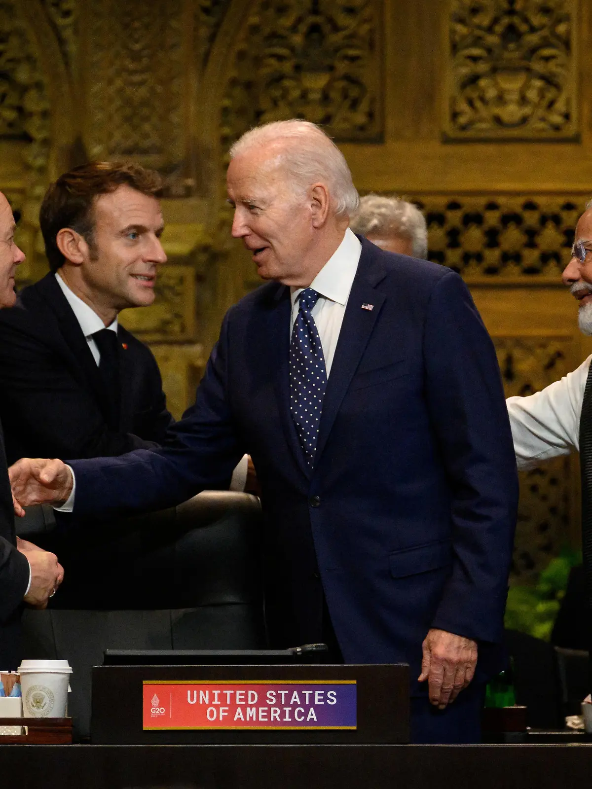 NUSA DUA, INDONESIA - NOVEMBER 15: (L-R) Chancellor Olaf Scholz of Germany, President Emmanuel Macron of France, President Joe Biden of the United States and  Prime Minister Narendra Modi of India chat ahead of a working session on food and energy security during the G20 Summit on November 15, 2022 in Nusa Dua, Indonesia. The G20 meetings are being held in Bali from November 15-16.  Leon Neal/Pool via REUTERS