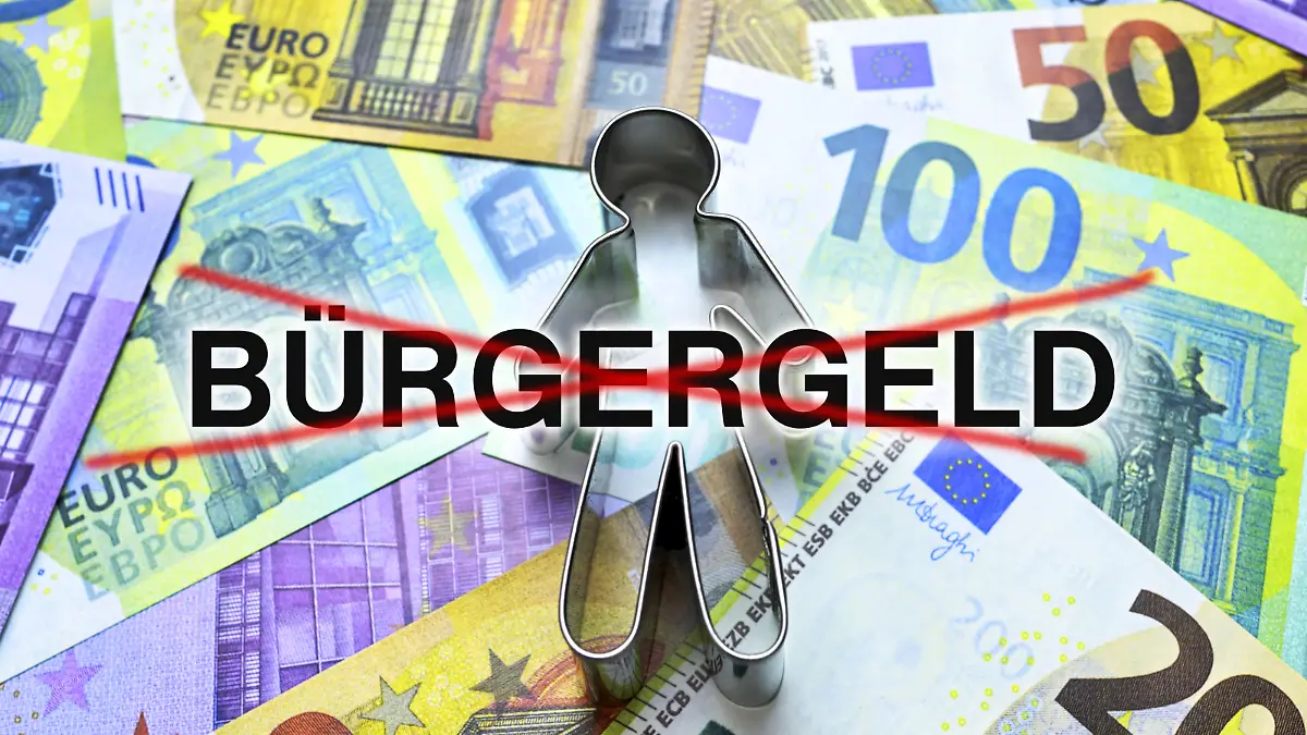 Figur auf Geldscheinen mit durchgestrichenem Schriftzug Bürgergeld, Bürgergeld wird von Bundesrat abgelehnt / action press