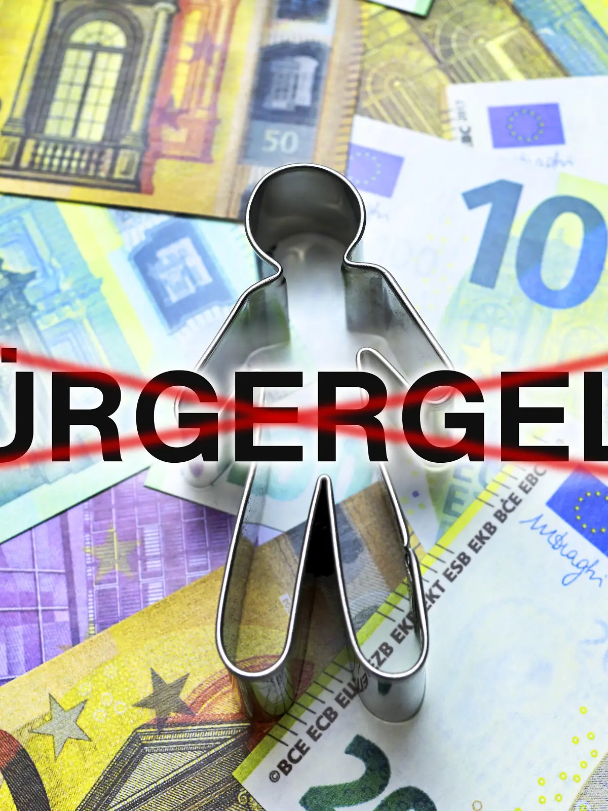 Figur auf Geldscheinen mit durchgestrichenem Schriftzug Bürgergeld, Bürgergeld wird von Bundesrat abgelehnt / action press