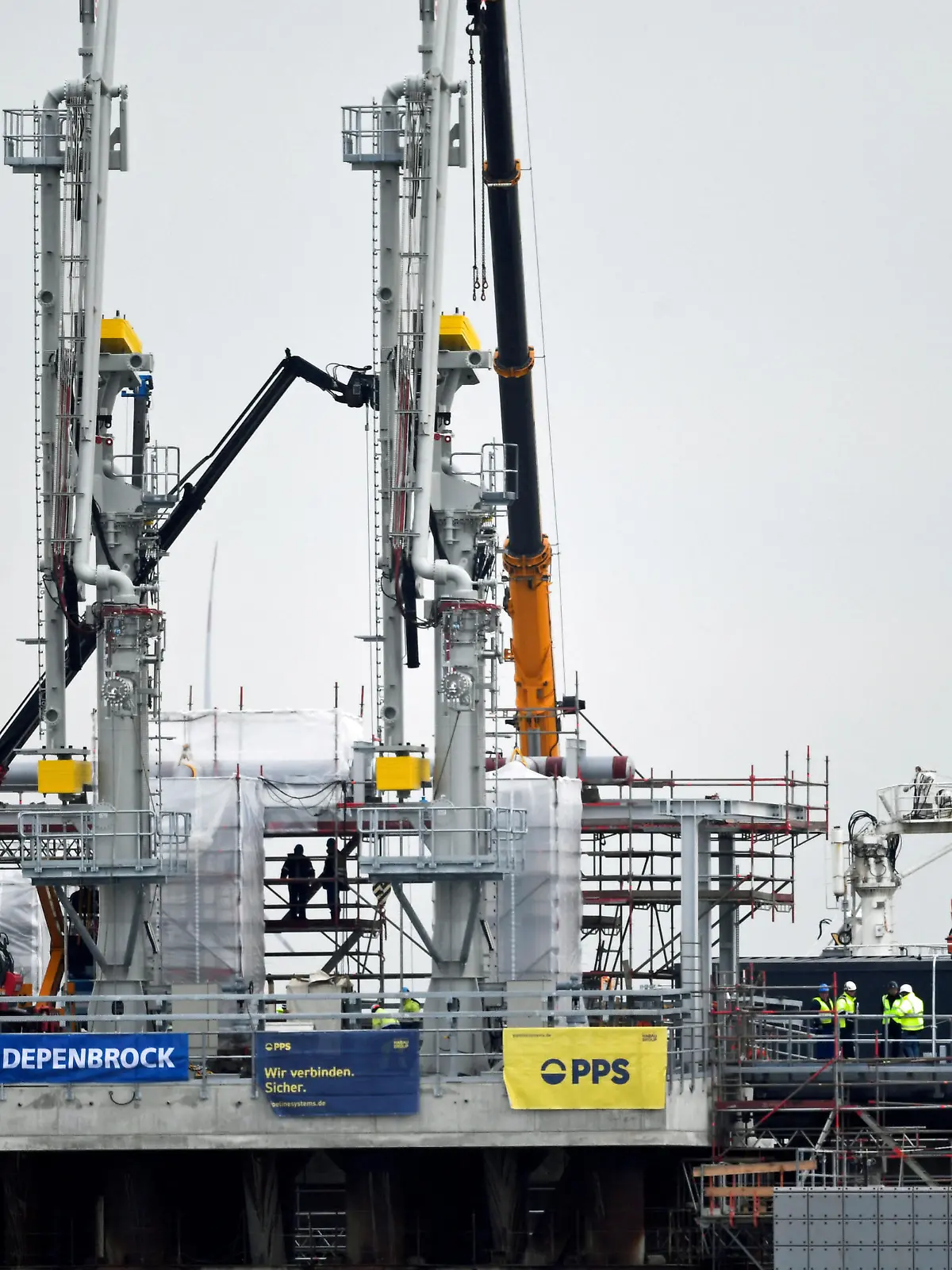 General view of the new floating LNG gas terminal, which allows Germany to import LNG via ship from other countries, in the harbour in Wilhelmshaven, Germany, November 15, 2022. REUTERS/Fabian Bimmer