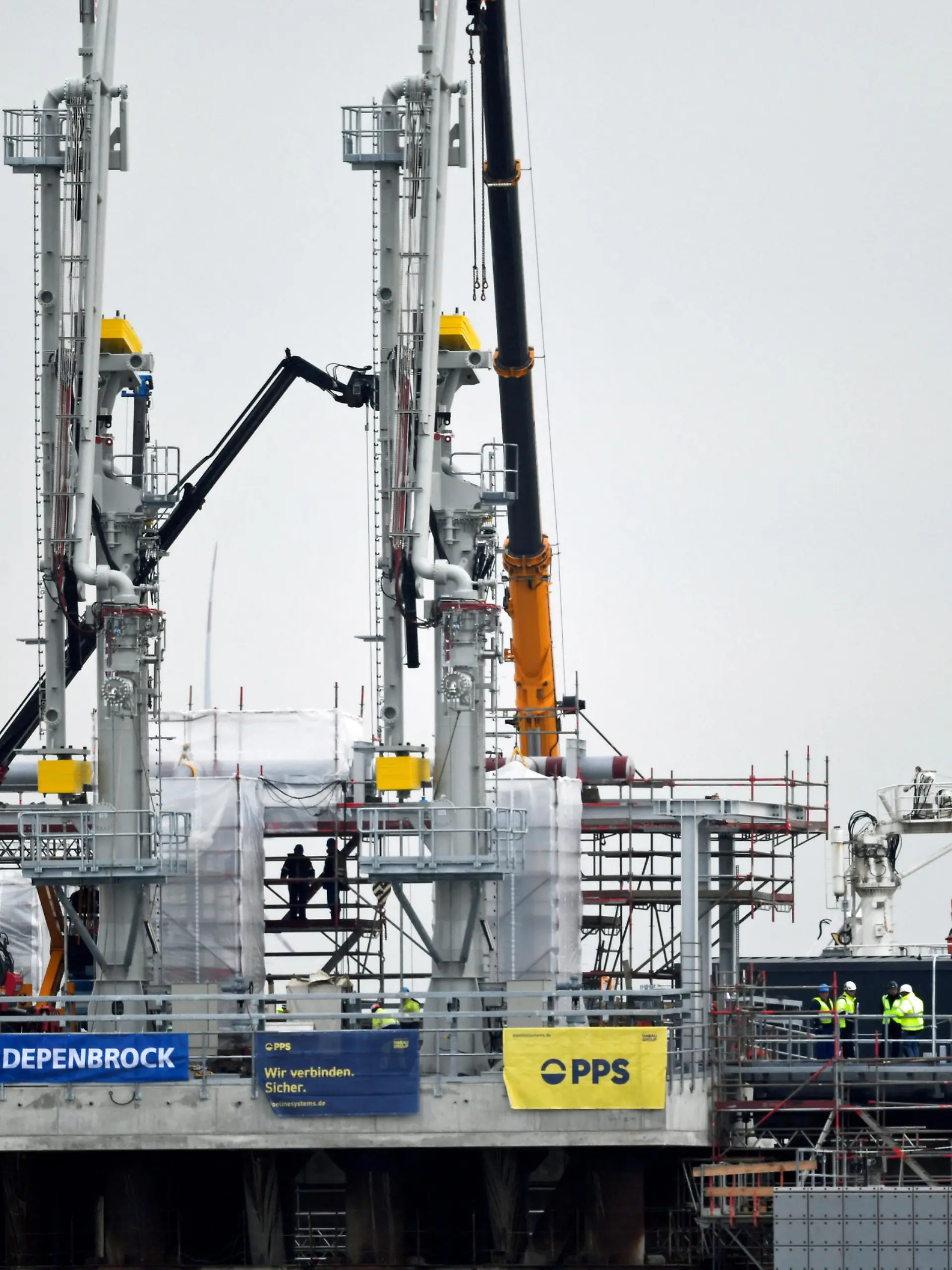 General view of the new floating LNG gas terminal, which allows Germany to import LNG via ship from other countries, in the harbour in Wilhelmshaven, Germany, November 15, 2022. REUTERS/Fabian Bimmer