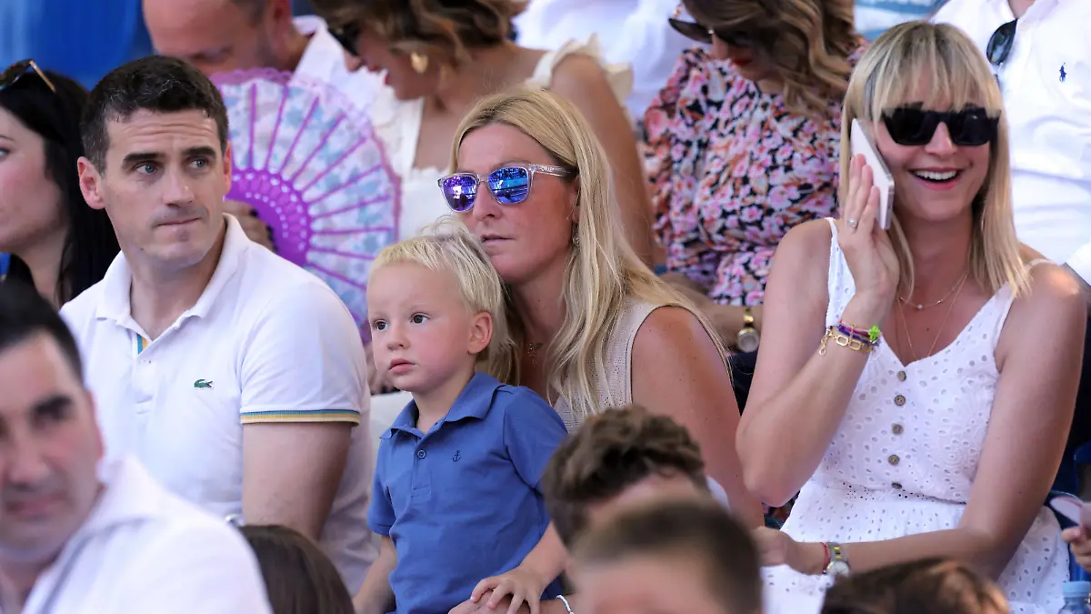 PXL_Traditional Alkar competiton was held in Sinj A former Croatian alpine skier Janica Kostelic with her son in the audience during the famous knight s game Sinjska Alka that was held for the 306th time in Sinj on August 8, 2021. Alka is the last stage of the competition after Bara and Coja. Alka is a competition in which alkars ride horses to throw an alka spear. The Alkar competition is conducted in such a way that the Alkar on horseback in a full race spears a spear that hangs in the middle of a rope stretched horizontally between two pillars attached to the edges of the racetrack. Each alkar wears an antique knight s uniform in the most beautiful splendor, consisting of a underpants trousers, a silk belt, embroidered barley and a shi IvoxCagalj/PIXSELL
