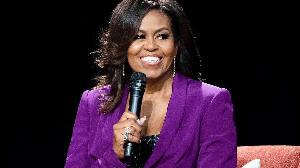ARCHIV - 12.05.2019, USA, Atlanta: Die ehemalige First Lady Michelle Obama lächelt bei einem Auftritt. Michelle Obama wird in die «National Women's Hall of Fame» aufgenommen. Foto: Paul R. Giunta/AP/dpa +++ dpa-Bildfunk +++