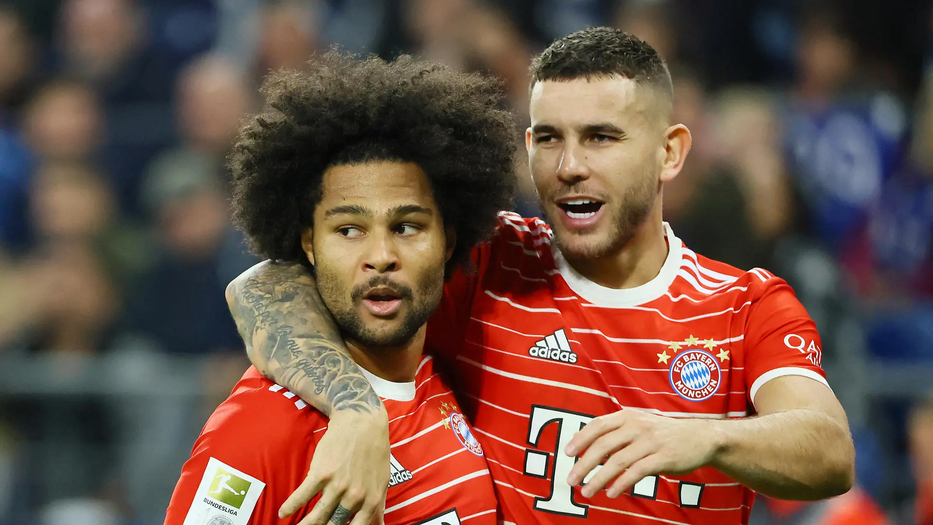 Soccer Football - Bundesliga - Schalke 04 v Bayern Munich - Veltins-Arena, Gelsenkirchen, Germany - November 12, 2022 Bayern Munich's Serge Gnabry celebrates scoring their first goal with Lucas Hernandez REUTERS/Wolfgang Rattay DFL REGULATIONS PROHIBIT ANY USE OF PHOTOGRAPHS AS IMAGE SEQUENCES AND/OR QUASI-VIDEO.