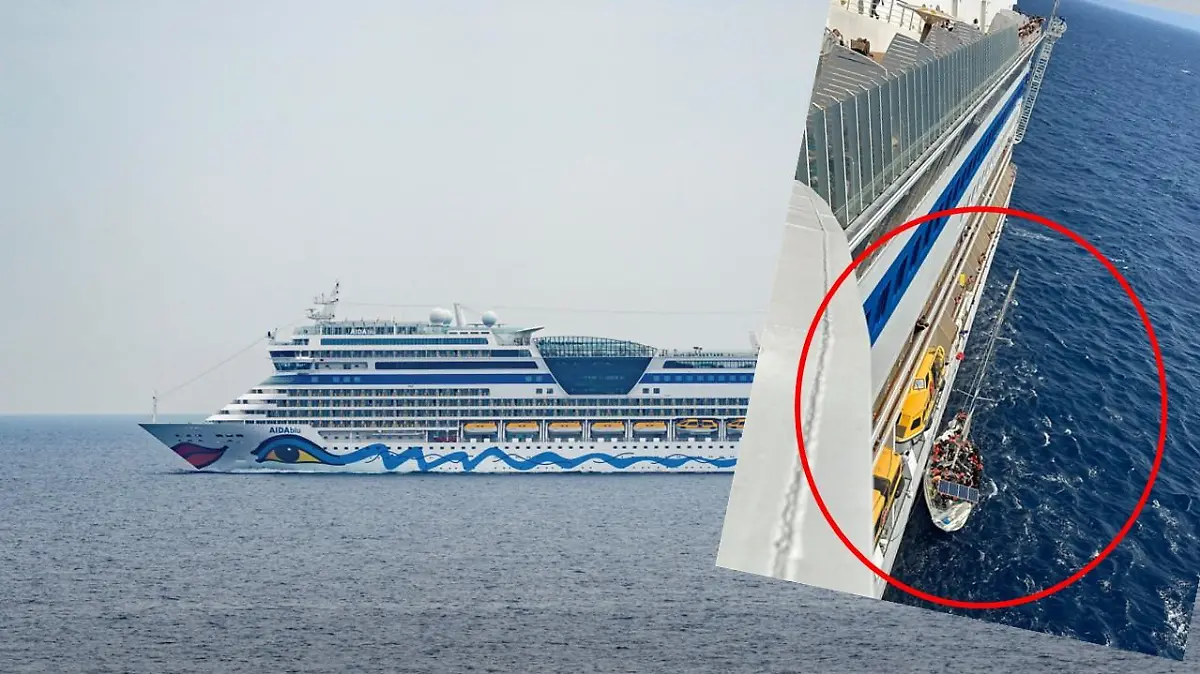 Ein Flüchtlingsboot hat am Kreuzfahrtschiff Aida Blu festgemacht