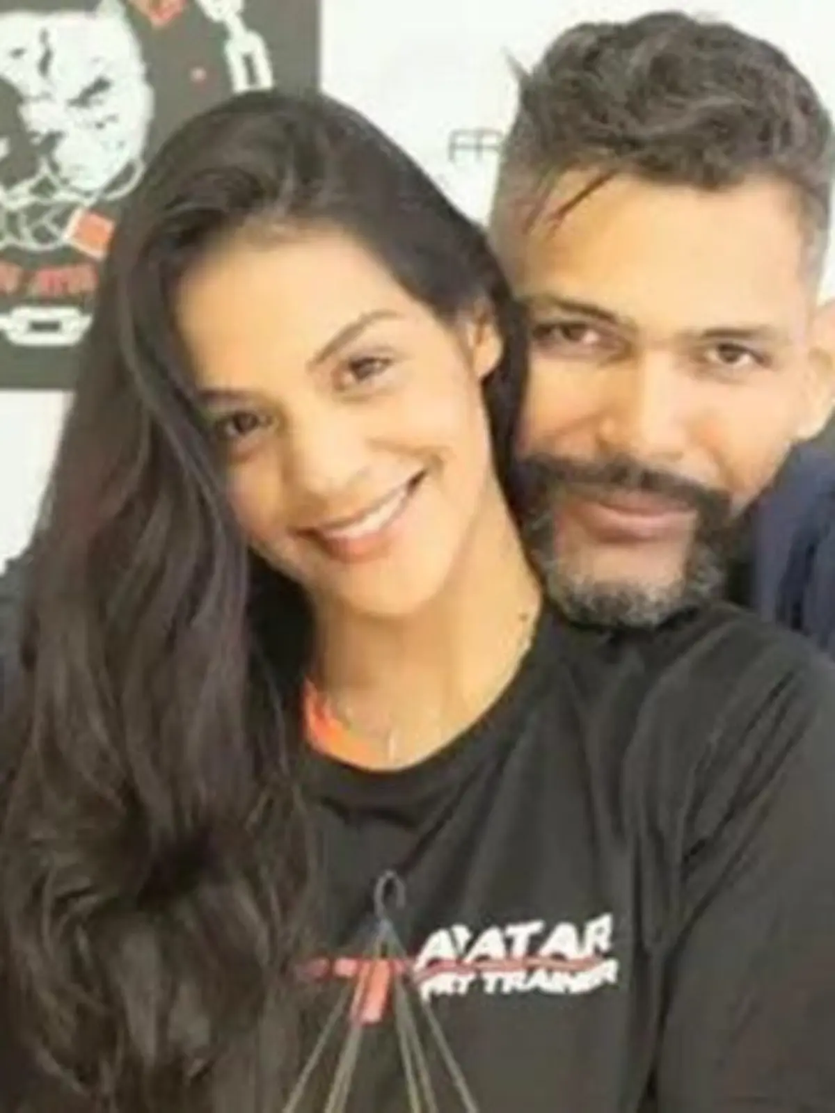 Story from Jam Press (Wrestler Kills Wife) 

Pictured: Former pro wrestler Luis Paulo Lima dos Santos and his wife, Ellida Tuane Ferreira da Silva Santos.

Pro wrestler busted for killing teacher wife, 26, and dumping body

A former pro wrestler has been arrested on suspicion of murdering his 26-year-old teacher-wife.

The body of Ellida Tuane Ferreira da Silva Santos was found near steam.

Her husband Luis Paulo Lima dos Santos, 44 -- also a gym owner -- is accused of shooting her four times in their apartment.

He is suspected of then dumping her tied body and filing a fake missing-person report.

The body of tragic Ellida -- who has a six-month-old son with him -- was found on the east side of São Paulo City, Brazil, on 7 November.

According to reports, the corpse was found wrapped in a sheet and tied with rope at her feet and hands.

Her husband was arrested on 9 November and accused of killing her on 4 November.

On the day of the alleged murder, the suspect even filed a missing person’s report to throw off the investigation.

The former pro-fighter claimed that his wife had left town by bus to travel to her mother’s house in the nearby city of Campinas and disappeared en route.

The police said the crime was motivated by jealousy but did not provide any further details.

Police chief Bruno Cogan said: “There are indications that it was because of jealousy, but it still needs to be investigated in depth.”

CCTV footage has emerged of the victim’s final images alive as well as the suspect appearing to remove the dead body from the apartment building in a trolley the next day.

In the images, Ellida is seen entering the lift at 9.30 pm on the day of her murder.

Neighbours told the police that they heard gunshots that night, but no one reported it to the police.

CCTV images from the following day (5 November) show the suspect entering the building with an empty trolley at around 9 pm.

Four minutes later, he reappears in the lift with the trolley ful
