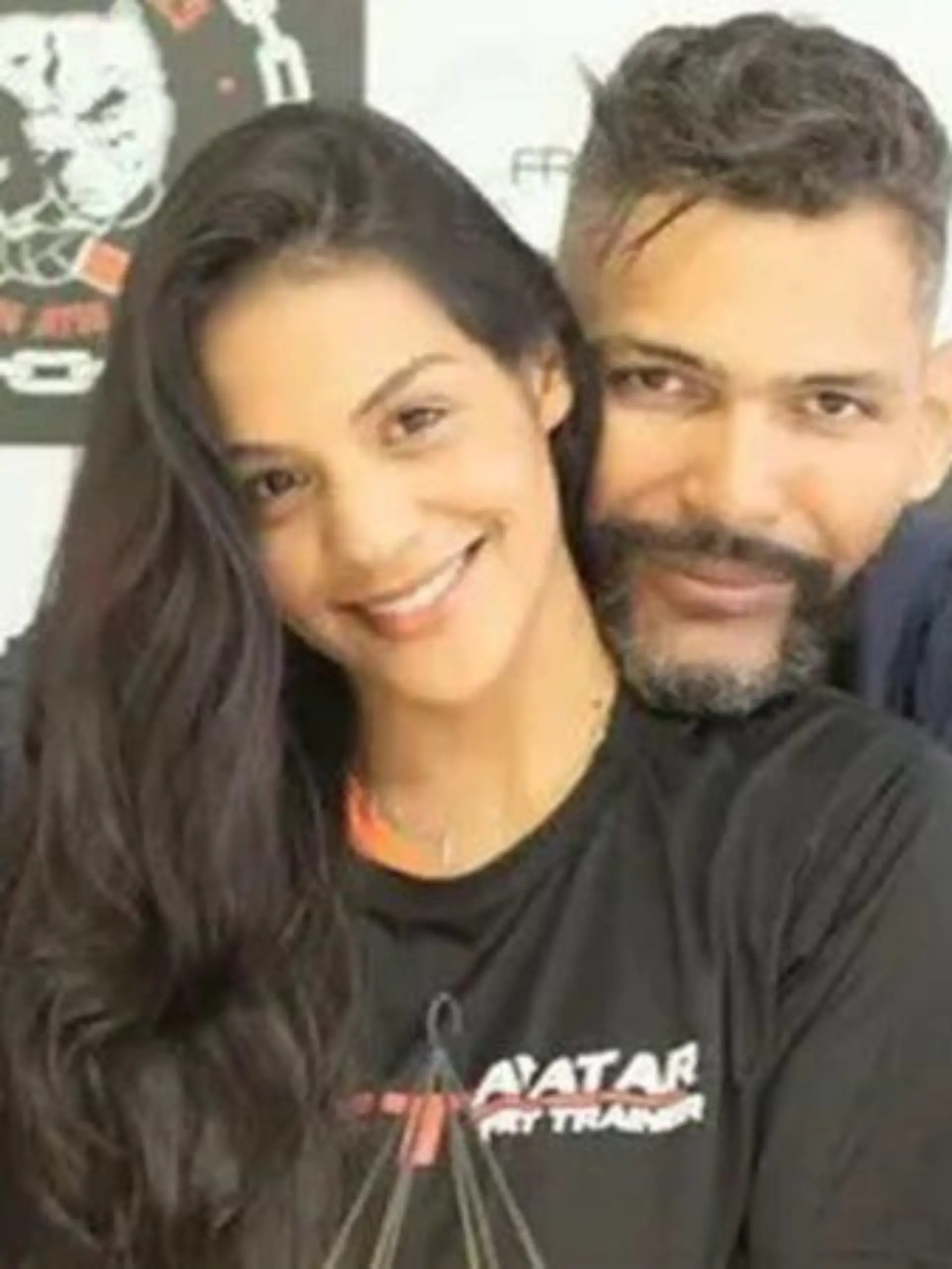 Story from Jam Press (Wrestler Kills Wife) 

Pictured: Former pro wrestler Luis Paulo Lima dos Santos and his wife, Ellida Tuane Ferreira da Silva Santos.

Pro wrestler busted for killing teacher wife, 26, and dumping body

A former pro wrestler has been arrested on suspicion of murdering his 26-year-old teacher-wife.

The body of Ellida Tuane Ferreira da Silva Santos was found near steam.

Her husband Luis Paulo Lima dos Santos, 44 -- also a gym owner -- is accused of shooting her four times in their apartment.

He is suspected of then dumping her tied body and filing a fake missing-person report.

The body of tragic Ellida -- who has a six-month-old son with him -- was found on the east side of São Paulo City, Brazil, on 7 November.

According to reports, the corpse was found wrapped in a sheet and tied with rope at her feet and hands.

Her husband was arrested on 9 November and accused of killing her on 4 November.

On the day of the alleged murder, the suspect even filed a missing person’s report to throw off the investigation.

The former pro-fighter claimed that his wife had left town by bus to travel to her mother’s house in the nearby city of Campinas and disappeared en route.

The police said the crime was motivated by jealousy but did not provide any further details.

Police chief Bruno Cogan said: “There are indications that it was because of jealousy, but it still needs to be investigated in depth.”

CCTV footage has emerged of the victim’s final images alive as well as the suspect appearing to remove the dead body from the apartment building in a trolley the next day.

In the images, Ellida is seen entering the lift at 9.30 pm on the day of her murder.

Neighbours told the police that they heard gunshots that night, but no one reported it to the police.

CCTV images from the following day (5 November) show the suspect entering the building with an empty trolley at around 9 pm.

Four minutes later, he reappears in the lift with the trolley ful