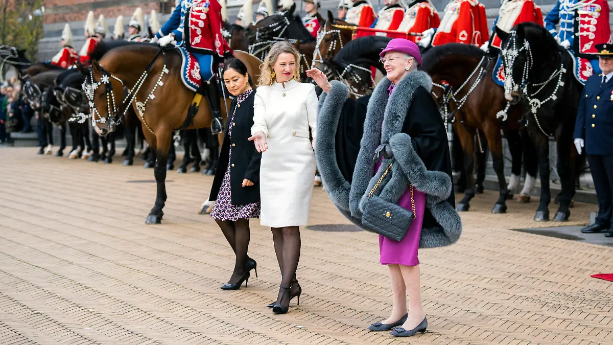 Denmark's Queen Margrethe waves as she arrives at Copenhagen City Hall, prior to the City's celebration of the Queen's 50th ruler jubilee, in Copenhagen, Denmark, Saturday Nov. 12, 2022. (Martin Sylvest/Ritzau Scanpix via AP)