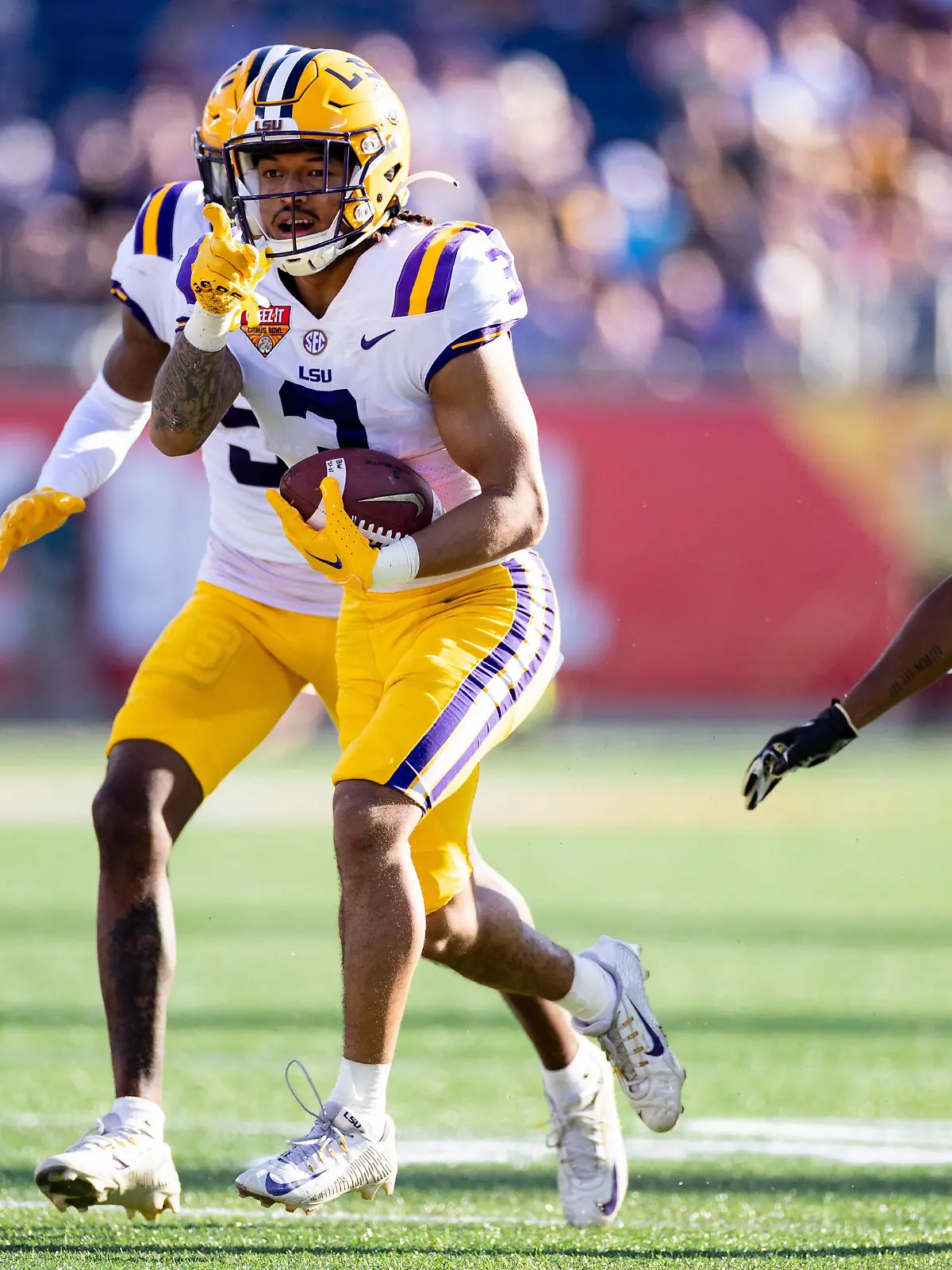  NCAA, College League, USA Football: Citrus Bowl-Purdue at Louisiana State Jan 2, 2023 Orlando, FL, USA LSU Tigers safety Greg Brooks Jr. 3 gestures after an interception during the second half against the Purdue Boilermakers at Camping World Stadium. Orlando Camping World Stadium FL USA, EDITORIAL USE ONLY PUBLICATIONxINxGERxSUIxAUTxONLY Copyright: xMattxPendletonx 20230102_jcd_ee7_0207 