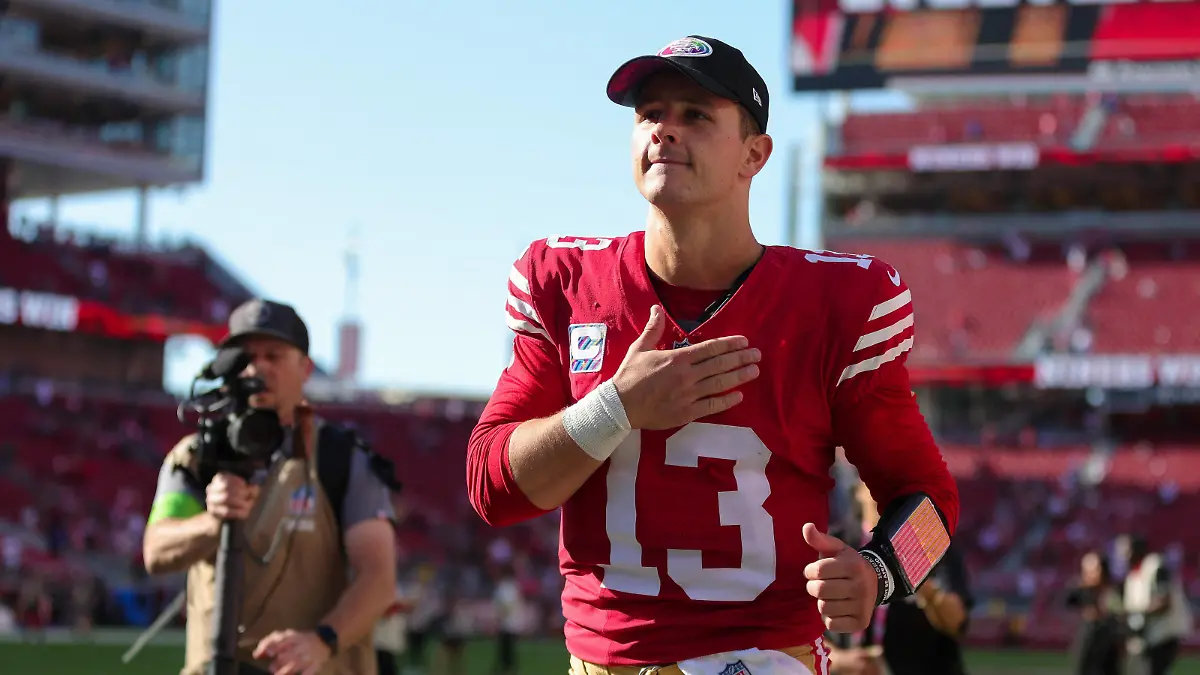 Oct 1, 2023; Santa Clara, California, USA; San Francisco 49ers quarterback Brock Purdy (13) runs off the field after the game against the Arizona Cardinals at Levi's Stadium. Mandatory Credit: Sergio Estrada-USA TODAY Sports
