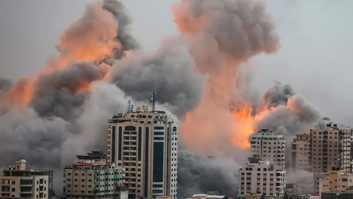 October 9, 2023, Gaza, Palestine: Flames and smoke billow during Israeli strikes in Gaza. Israel imposed a total siege on the Gaza Strip on October 9 and cut off the water supply as it kept bombing targets in the crowded Palestinian enclave in response to the Hamas surprise assault it has likened to the 9/11 attacks. Gaza Palestine - ZUMAs197 20231009_aaa_s197_414 Copyright: xAhmedxZakotx