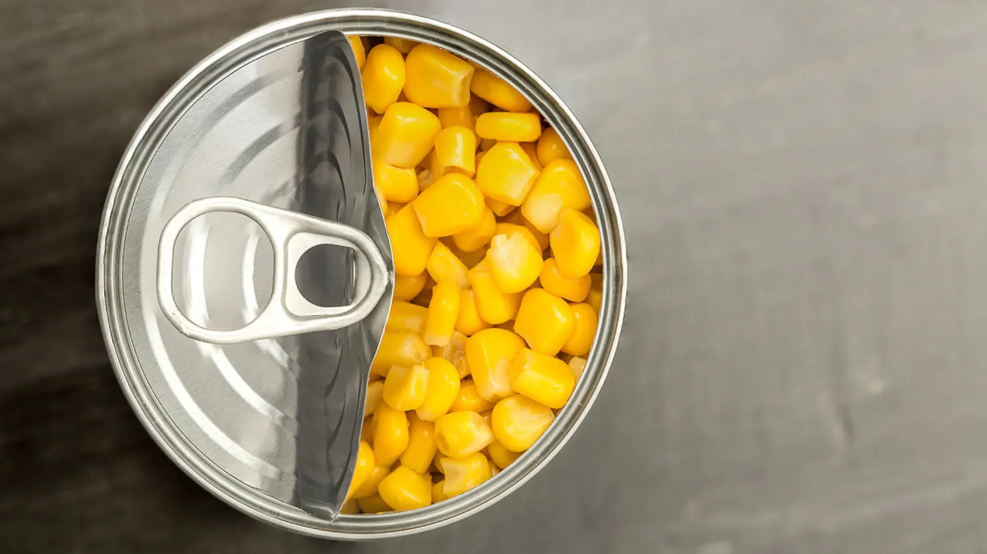 looking down on a tin of sweet corn