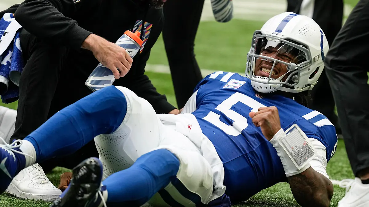 Indianapolis Colts quarterback Anthony Richardson (5) lies on the field after being injured during the first half of an NFL football game against the Tennessee Titans, Sunday, Oct. 8, 2023, in Indianapolis. (AP Photo/Darron Cummings)