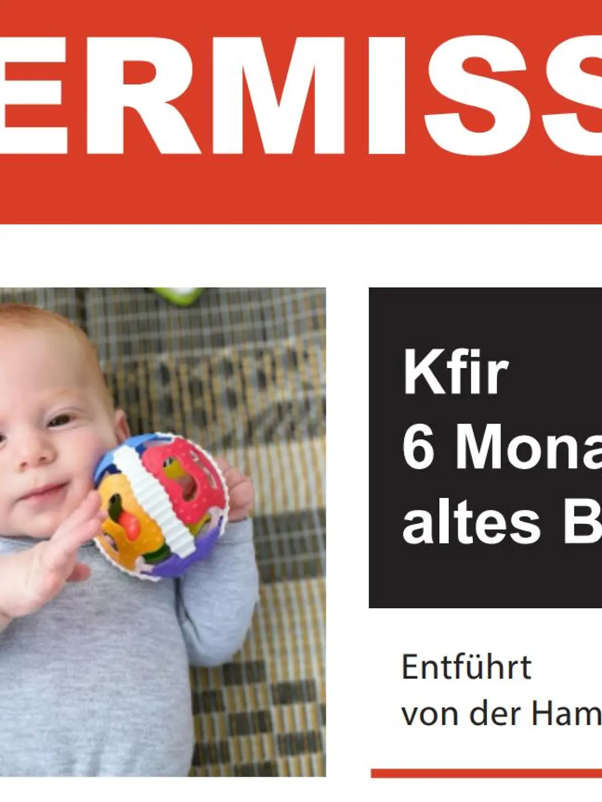 Ein Säugling guckt in die Kamera.