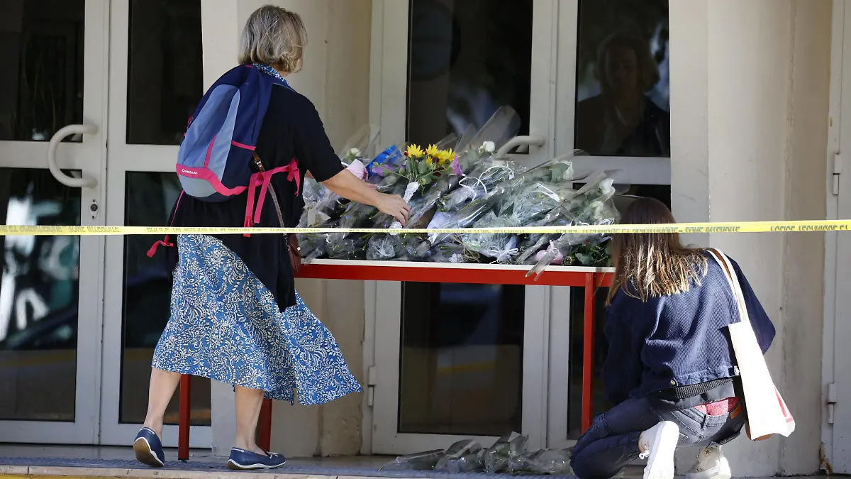 The Day After Knife Attack - Arras Pupils and their families arrive to the Gambetta high school in Arras, northeastern France on October 14, 2023, to pay respect to teacher Dominique Bernard who was killed and two other people severely wounded in a knife attack. Mohammed Mogouchkov, a man of Chechen origin, stabbed to death a teacher and severely wounded two other adults on October 13 at a school in northeastern France, with prosectors opening a probe into a suspected act of terror. Photo by Raphael Lafargue/ABACAPRESS.COM Arras France PUBLICATIONxNOTxINxFRAxESPxUKxUSAxBELxPOL Copyright: xLafarguexRaphael/ABACAx 871614_103 LafarguexRaphael/ABACAx 871614_103