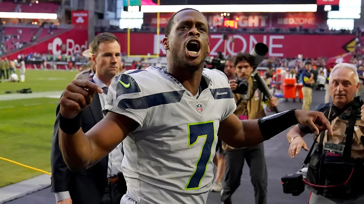 Seattle Seahawks quarterback Geno Smith (7) reacts toward fans after an NFL football game against the Arizona Cardinals in Glendale, Ariz., Sunday, Nov. 6, 2022. (AP Photo/Matt York)