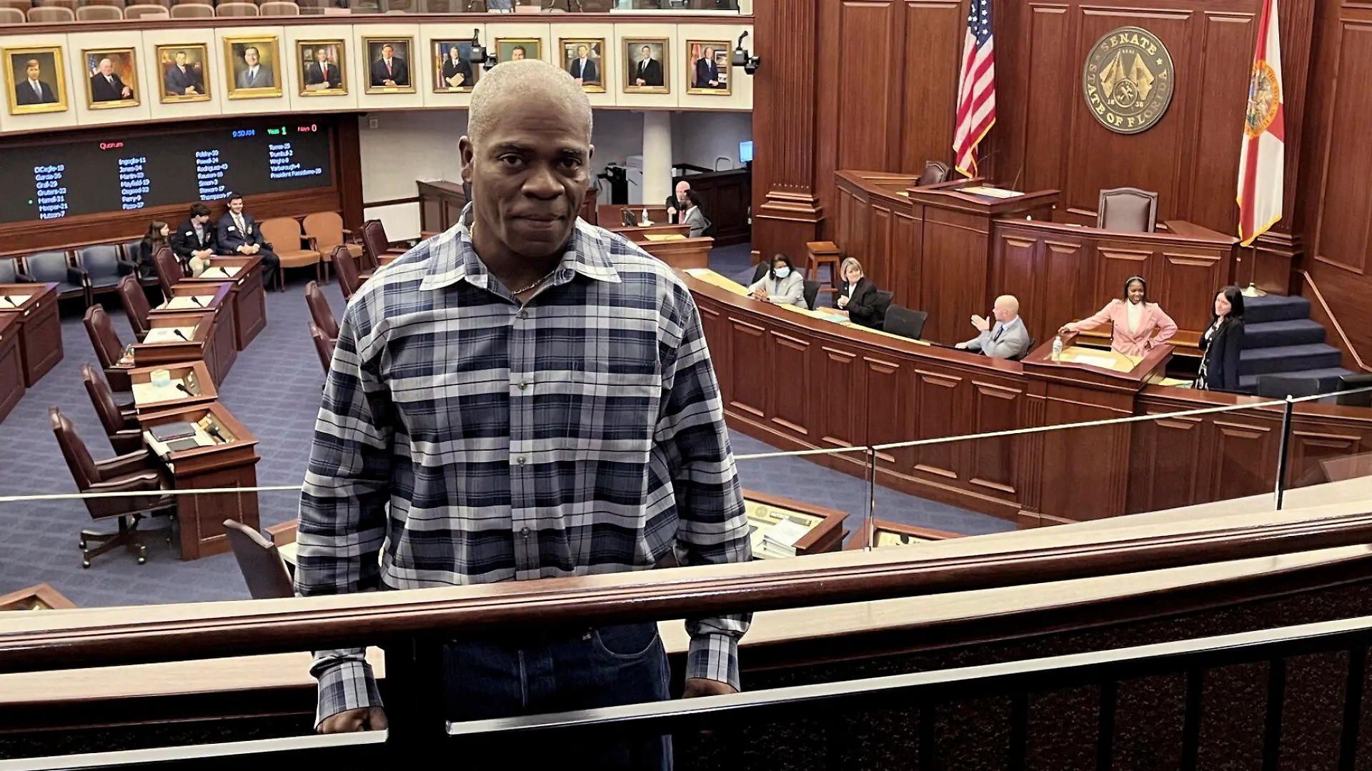 In this photo provided by the Innocence Project of Florida, Leonard Allen Cure poses from the floor of the Florida legislature in Tallahassee, Fla., in April 2023, on the day his compensation bill was passed. Cure, who spent more than 16 years in prison in Florida on a wrongful conviction, was shot and killed Monday, Oct. 156, by a sheriff's deputy in Georgia during a traffic stop, authorities and representatives said. (Innocence Project of Florida via AP)