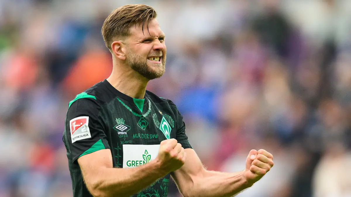 08.05.2022, Sachsen, Aue: Fußball: 2. Bundesliga, FC Erzgebirge Aue - SV Werder Bremen, 33. Spieltag, Erzgebirgsstadion. Bremens Niclas Füllkrug jubelt nach seinem Tor zum 0:2. (zu dpa: «Die Sprüche zum 8. Spieltag der Fußball-Bundesliga») (zu dpa: «Völler sieht Chancen für Füllkrug auf Nominierung für Fußball-WM») Foto: Robert Michael/dpa +++ dpa-Bildfunk +++