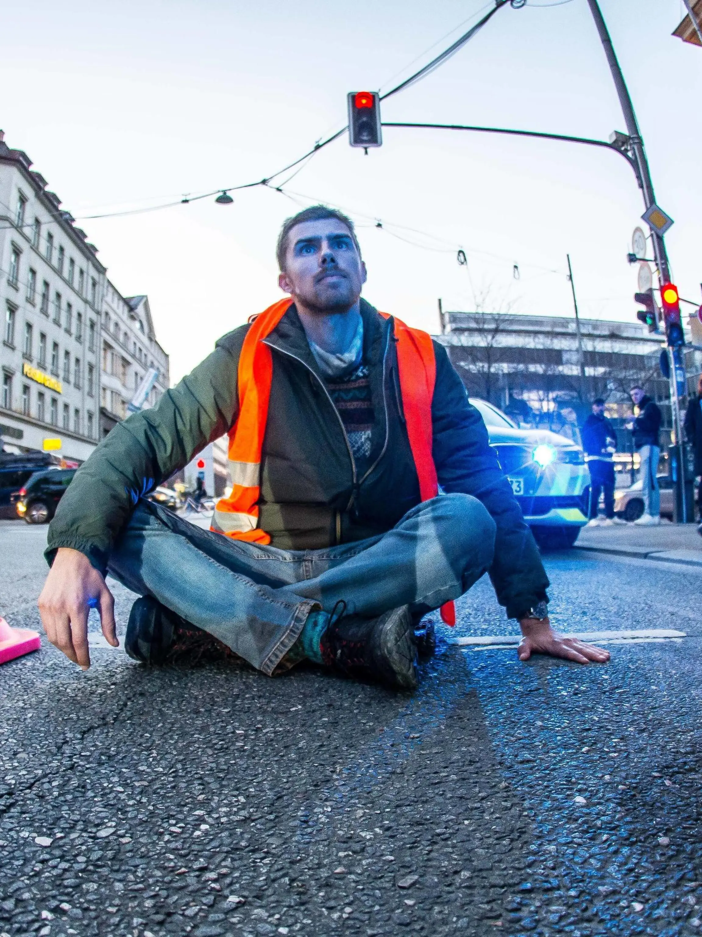  November 7, 2022, Munich, Bavaria, Germany: Climate activists one of two pictured from Letzte Generation Last Generation krazy glued themselves to the roadway at the Munich main train station Hauptbahnhof. The demonstrator, Micha from Passau is a 25 year old that demands attention be placed on the climate catastrophe. Munich Germany - ZUMAb160 20221107_zbp_b160_045 Copyright: xSachellexBabbarx