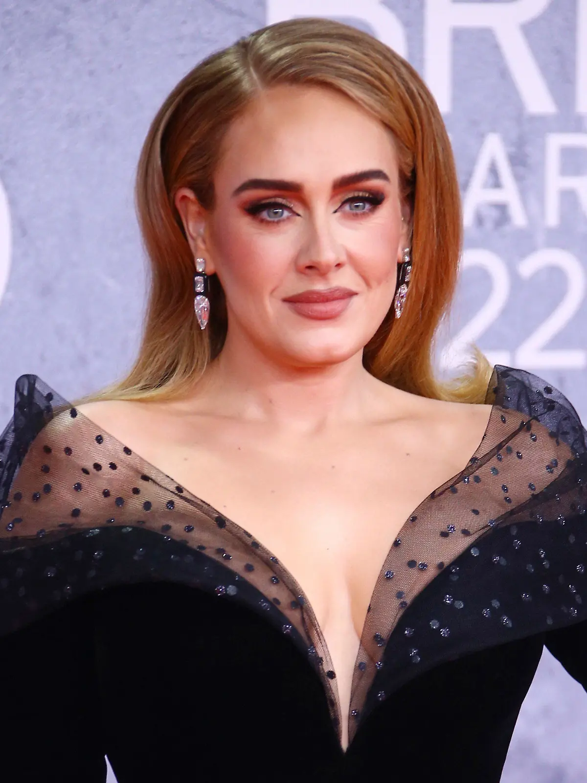 FILE - Adele appears at the Brit Awards 2022 in London on Feb. 8, 2022. Adele is nominated for seven Grammy Awards. The 2023 Grammy Awards will air live Sunday, Feb. 5. (Photo by Joel C Ryan/Invision/AP, File)