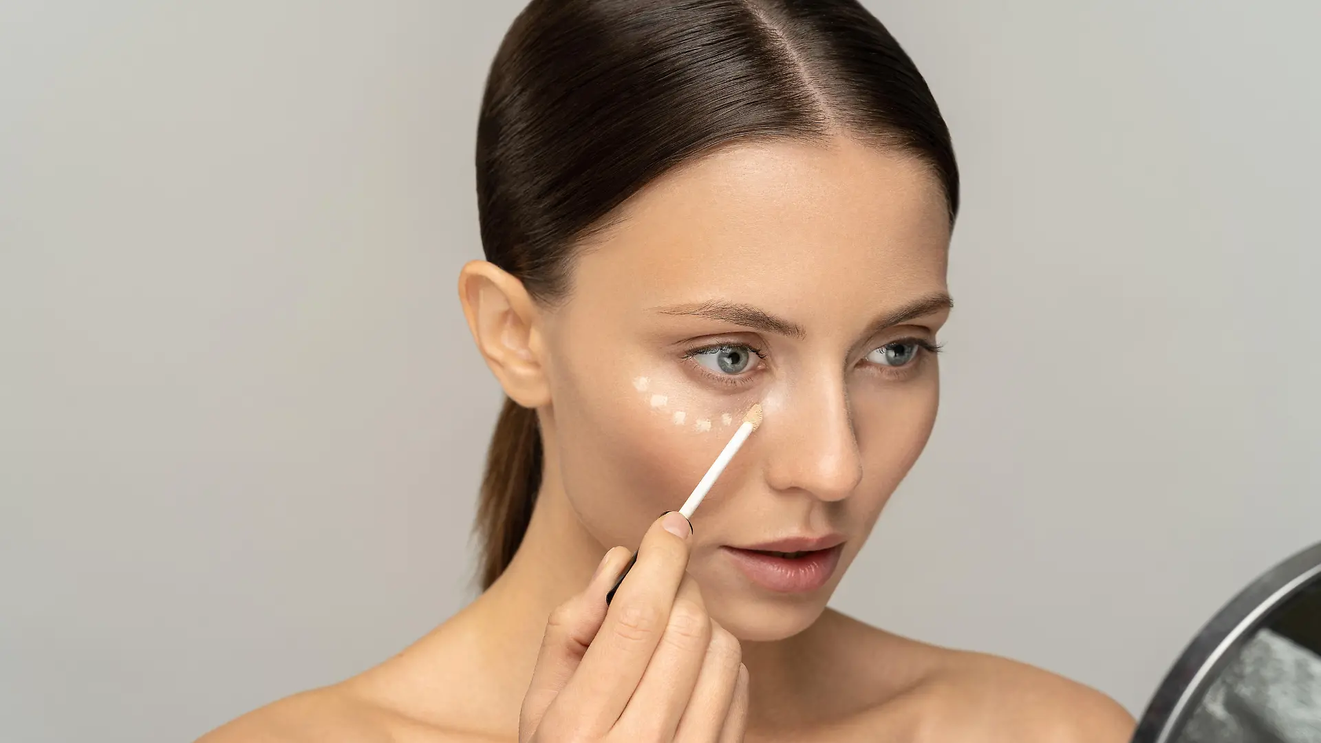 Woman with natural makeup applying concealer on flawless fresh skin, doing make up, looking at mirror. Girl after shower put corrector under eye area. Beauty face, skin care. Copy space, advertising. Model Released Property Released xkwx conceal, face, eye, apply, makeup, corrector, tassel, applicator, beauty, foundation, facial, dots, skincare, eye circles, natural, cosmetology, cosmetic, tone, skin, clean, product, vogue, smooth, wellness, wellbeing, isolated, preparation, perfection, contour, age, routine, primer, beige, coverage, circles, mirror, girl, woman, under, liquid, model, concealer, cream, pencil, base, visage, brush, caucasian