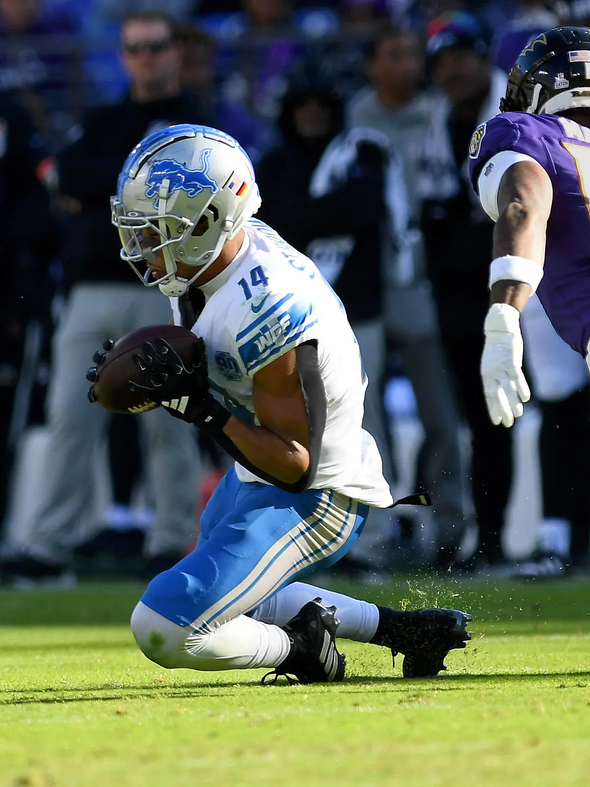 BALTIMORE, MD - OCTOBER 22: Lions wide receiver Amon-Ra St. Brown 14 makes a catch during the Detroit Lions versus Baltimore Ravens NFL, American Football Herren, USA game at M&T Bank Stadium on October 22, 2023 in Baltimore, MD. Photo by Randy Litzinger/Icon Sportswire NFL: OCT 22 Lions at Ravens EDITORIAL USE ONLY Icon9662310220724