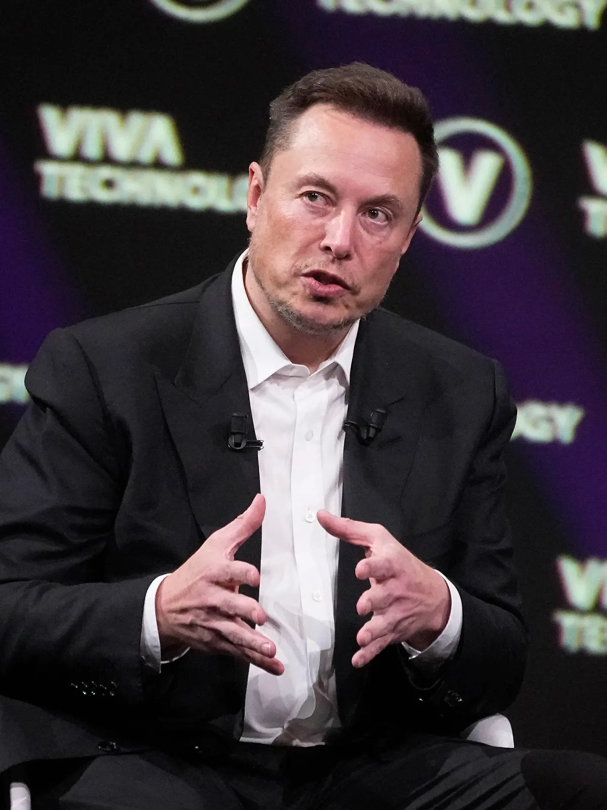 FILE - Elon Musk, who owns Twitter, Tesla and SpaceX, speaks at the Vivatech fair, in Paris, France, Friday, June 16, 2023. The head of Elon Musk’s social media platform X says the company formerly known has Twitter has removed hundreds of Hamas-linked accounts and taken down or labeled thousands of pieces of content since the militant group’s attack on Israel. (AP Photo/Michel Euler, File)