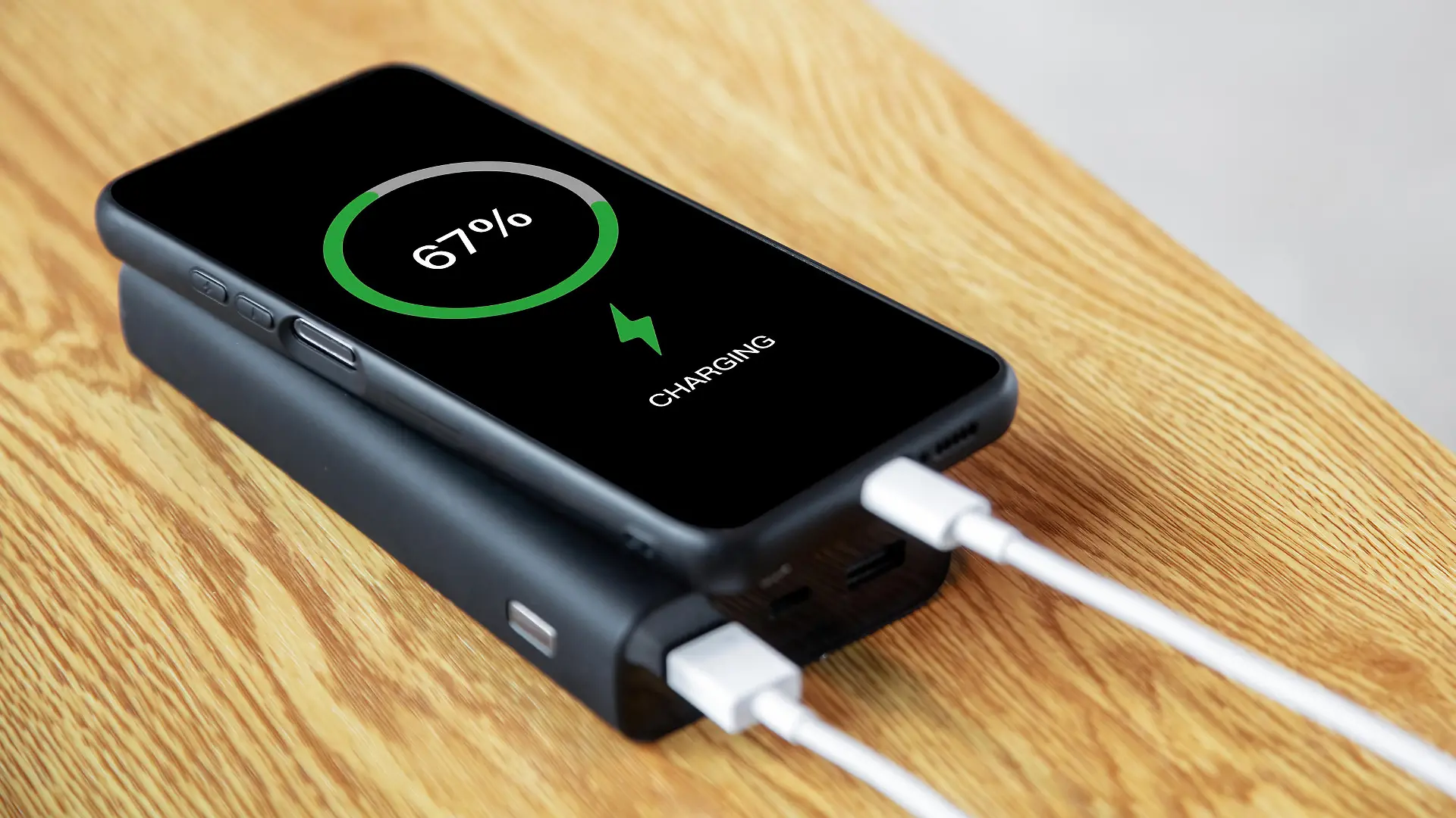 Use power bank to charge mobile phone anytime anywhere, charge sharing concept