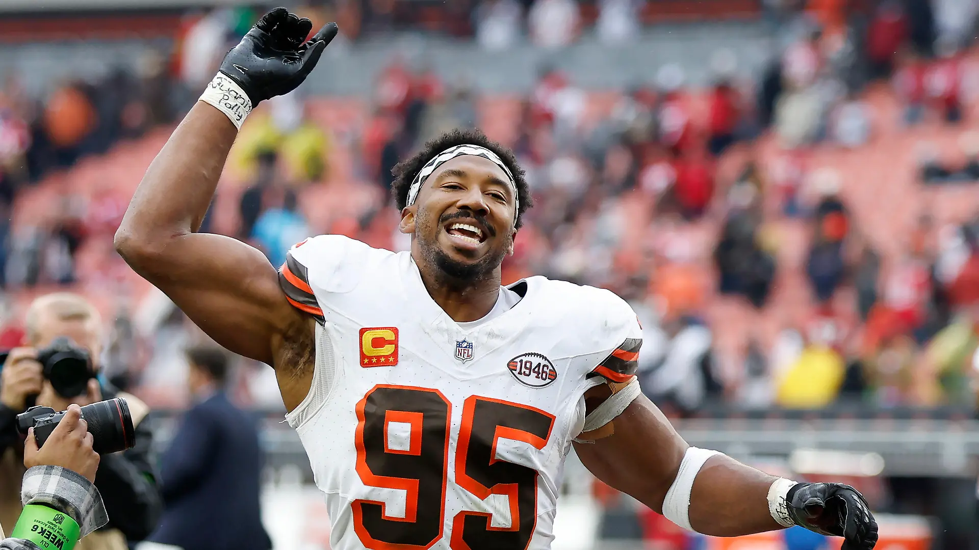 Cleveland Browns defensive end Myles Garrett (95) celebrates as he leaves the field after an NFL football game against the San Francisco 49ers Sunday, Oct. 15, 2023, in Cleveland. (AP Photo/Ron Schwane)