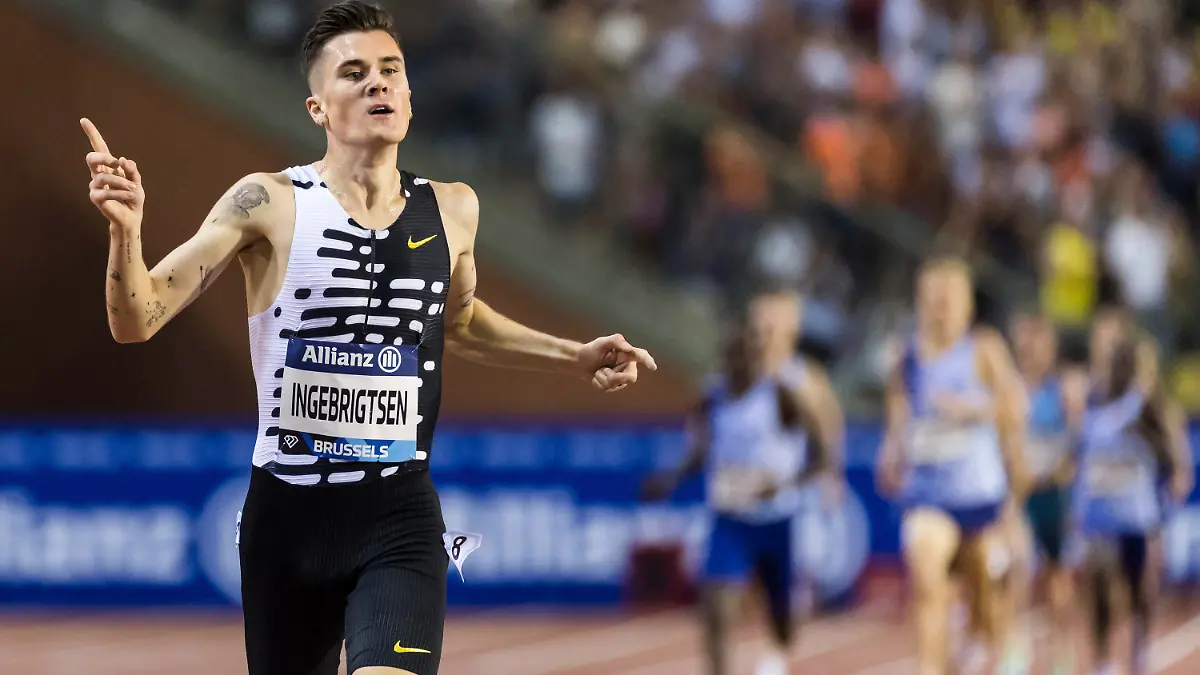 FILE - Jakob Ingebrigtsen from Norway crosses the finish line to win the 2000m men event and set a new world record time during the Diamond League Memorial Van Damme athletics event at the King Baudouin stadium, Brussels, on Sept. 8, 2023. Norwegian police launched an investigation Thursday, Oct. 26, 2023, into allegations by the three Ingebrigtsen brothers that their father, who had been their track coach at the Olympics and other events, was violent and abusive when they were growing up. (AP Photo/Geert Vanden Wijngaert)