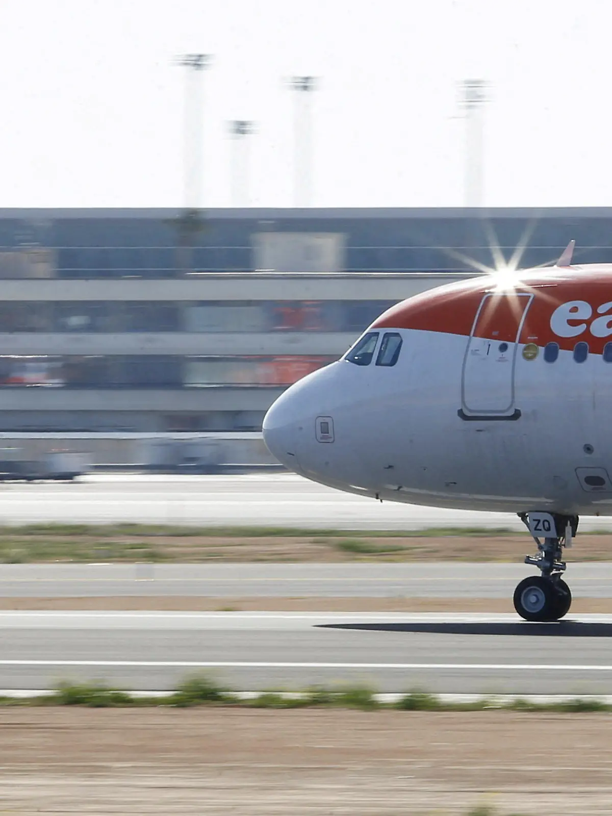 FILE PHOTO: An EasyJet airliner lands at Son Sant Joan airport in Palma de Mallorca, Spain, April 1, 2021. REUTERS/Enrique Calvo/File Photo