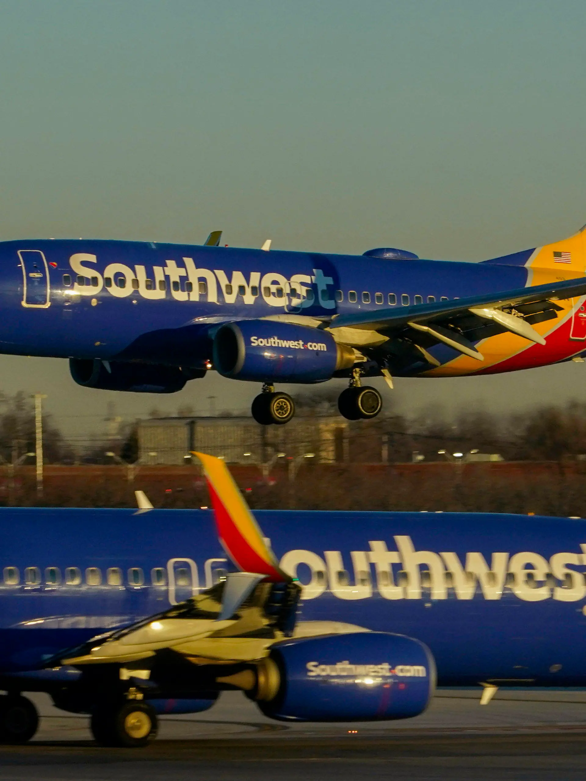 FILE - Southwest Airlines plane prepares to land at Midway International Airport, Feb. 12, 2023, in Chicago. On Monday, Oct. 16, Southwest Airlines announced that it is lowering the requirements to qualify for the top levels of its frequent-flyer program, a move aimed at travelers who are unhappy with other airlines that are making it harder to reach elite status. (AP Photo/Kiichiro Sato, File)