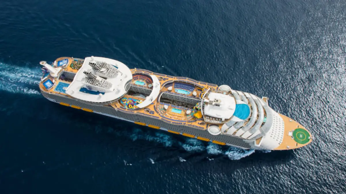 SY, Symphony of the Seas, Aerial view at sea offshore Barcelona, Spain, on April 6, 2018, day, daytime, almost straight top down view, showing partial starboard side,