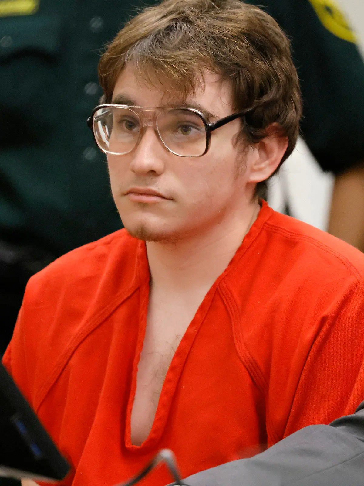 Parkland shooter Nikolas Cruz sits at the defense table during a victim impact statement at his sentencing hearing at the Broward County Courthouse in Fort Lauderdale, Fla., on Wednesday, Nov. 2, 2022. Cruz was formally sentenced to life in prison for murdering 17 people at Parkland's Marjory Stoneman Douglas High School more than four years ago. (Amy Beth Bennett/South Florida Sun Sentinel via AP, Pool)