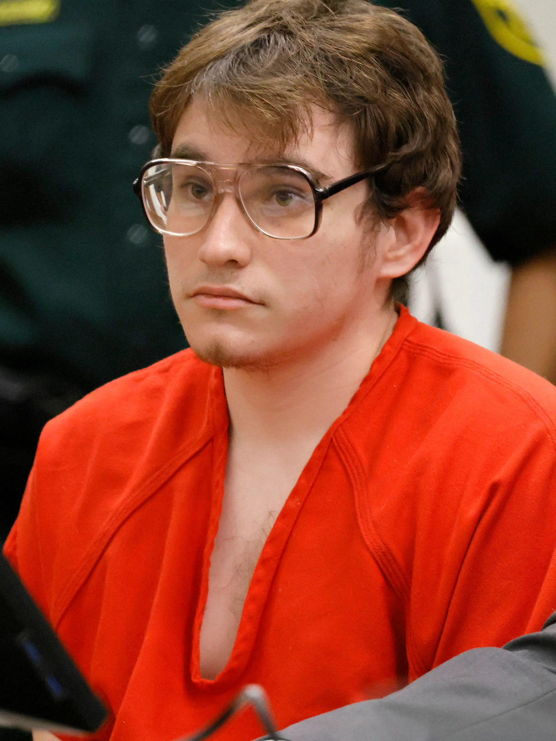 Parkland shooter Nikolas Cruz sits at the defense table during a victim impact statement at his sentencing hearing at the Broward County Courthouse in Fort Lauderdale, Fla., on Wednesday, Nov. 2, 2022. Cruz was formally sentenced to life in prison for murdering 17 people at Parkland's Marjory Stoneman Douglas High School more than four years ago. (Amy Beth Bennett/South Florida Sun Sentinel via AP, Pool)