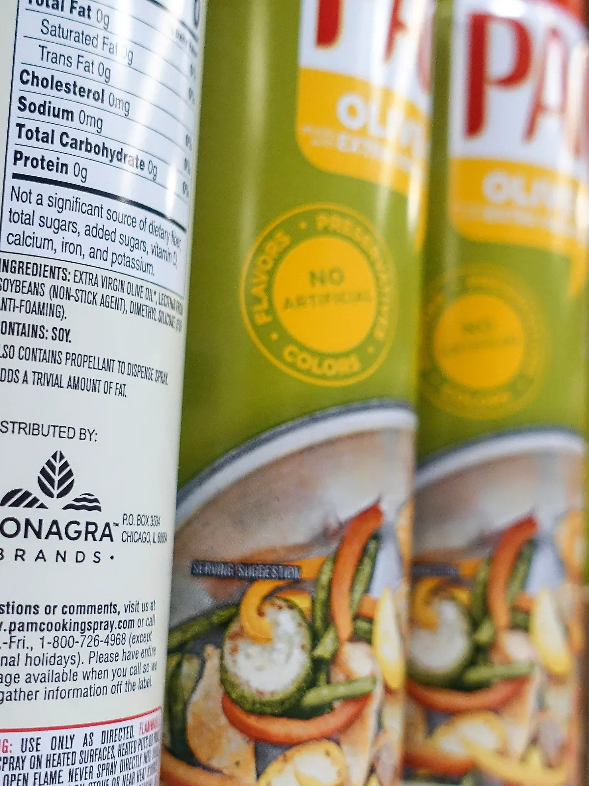 FILE - Cooking spray oils by Pam, a Conagra brand, rest on a supermarket shelf, June 25, 2019, in Cincinnati. On Monday, Oct. 30, 2023, a jury in Illinois ordered Chicago-based Conagra Brands to pay $7.1 million to a Pennsylvania woman who was badly injured in 2017 when a can of commercial brand cooking spray ignited in a kitchen at her workplace and set her aflame. The verdict is the first of numerous other cases from burn victims across the country with similar stories citing accidents that occurred with Conagra-made cooking spray brands, including its popular grocery store brand Pam. (AP Photo/John Minchillo, File)