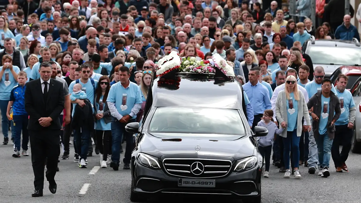 Co. Monaghan crash. The funeral procession of Kiea McCann makes its way to the Sacred Heart Chapel in Clones, Co. Monaghan for her funeral. Dlava Mohamed, 16, and Kiea McCann, 17, both students at Largy College in Clones, were killed, and three others were injured on the N54 Clones to Smithborough road at Legnakelly, Co. Monaghan, after a road traffic collision at around 6.45pm on Monday. Picture date: Thursday August 3, 2023. See PA story FUNERAL Monaghan. Photo credit should read: Liam McBurney/PA Wire URN:73223565