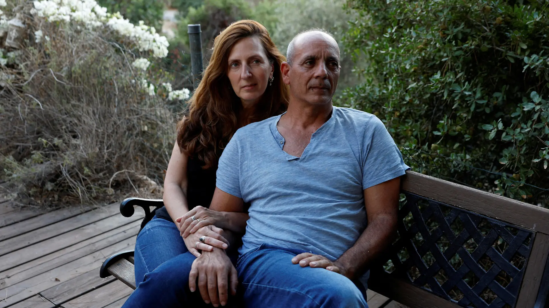 Nissim and Ricarda Louk, the parents of Shani Louk, 22, who was taken hostage by Hamas after being seized from the Nova festival, following a deadly infiltration by Hamas gunmen from the Gaza Strip into Israel, and who was later confirmed dead by Israel's government, are photographed in their home in Srigim-Li On, Israel October 31, 2023. REUTERS/Evelyn Hockstein REFILE - CORRECTING LOCATION FROM "BEIT GUVRIN " TO "SRIGIM-LI ON\