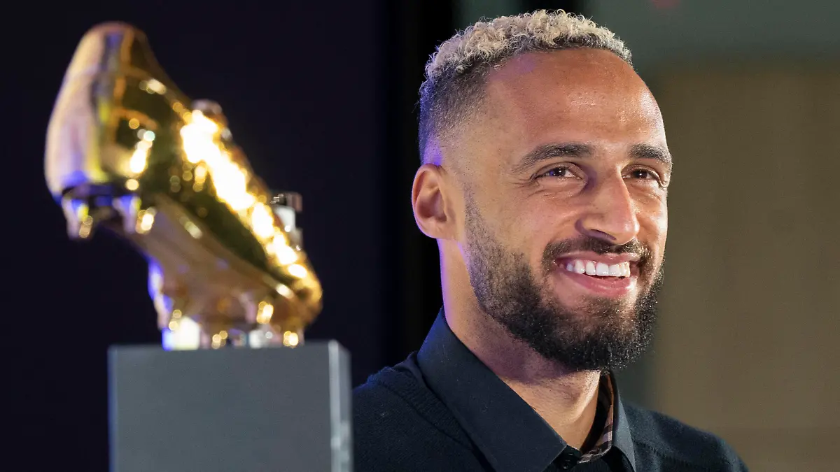 Nov 1, 2022; Nashville, Tennessee, USA;
Nashville SC's Hany Mukhtar smiles as he receives his Landon Donovan MLS MVP award during a press conference at Geodis Park.  Mandatory Credit: George Walker IV - USA TODAY Sports