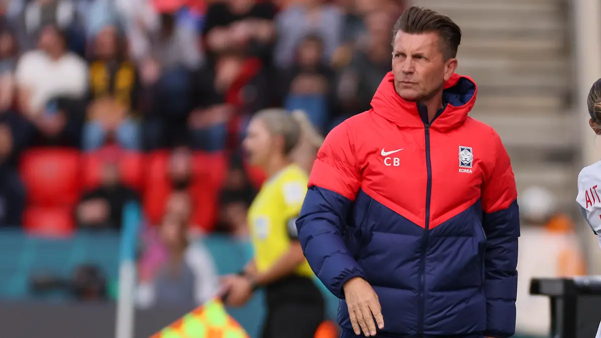 South Korea's head coach Colin Bell walks the sideline during the Women's World Cup Group H soccer match between South Korea and Morocco in Adelaide, Australia, Sunday, July 30, 2023. (AP Photo/James Elsby)