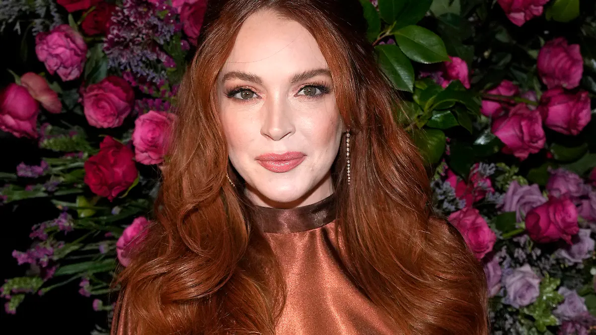 ARCHIV - 09.02.2023, USA, New York: Lindsay Lohan bei der Christian Siriano Herbst/Winter 2023 Modenschau in New York. Lohan und ihr Ehemann Shammas sind Mitte 2023 Eltern geworden. (zu dpa «US-Schauspielerin Lindsay Lohan ist Mutter geworden») Foto: Charles Sykes/Invision/AP/dpa +++ dpa-Bildfunk +++
