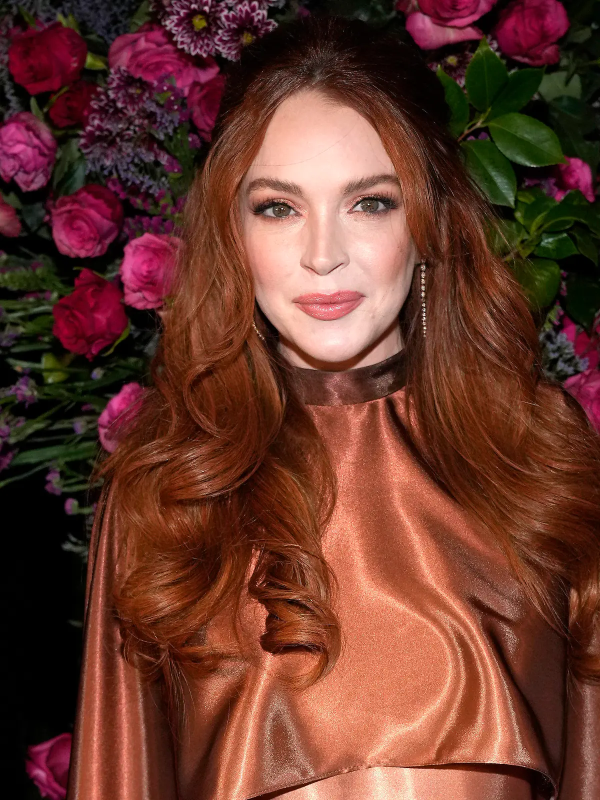 ARCHIV - 09.02.2023, USA, New York: Lindsay Lohan bei der Christian Siriano Herbst/Winter 2023 Modenschau in New York. Lohan und ihr Ehemann Shammas sind Mitte 2023 Eltern geworden. (zu dpa «US-Schauspielerin Lindsay Lohan ist Mutter geworden») Foto: Charles Sykes/Invision/AP/dpa +++ dpa-Bildfunk +++