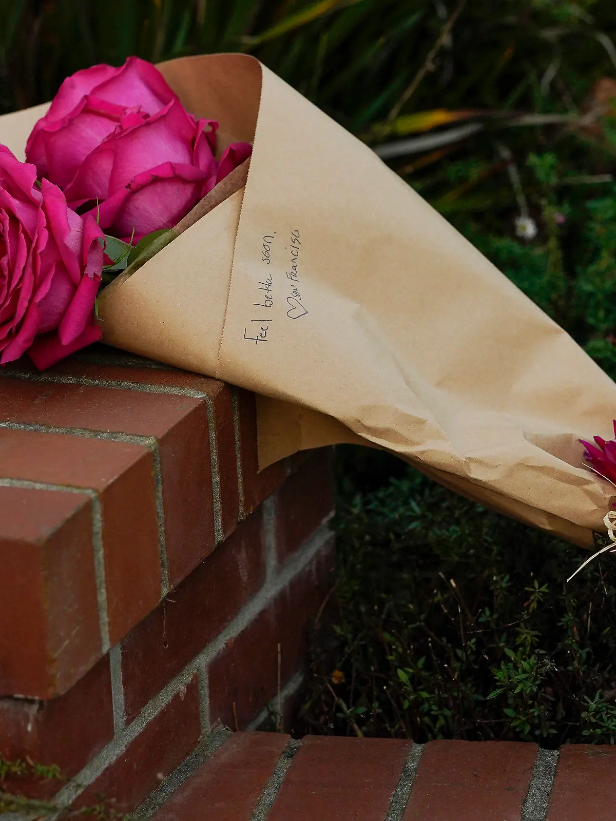 Flowers can be seen outside the home of House Speaker Nancy Pelosi and her husband Paul Pelosi in San Francisco, Friday, Oct. 28, 2022. Paul Pelosi, was attacked and severely beaten by an assailant with a hammer who broke into their San Francisco home early Friday, according to people familiar with the investigation. (AP Photo/Godofredo A. Vásquez)