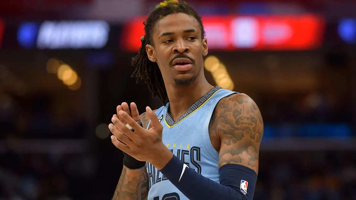 Memphis Grizzlies guard Ja Morant (12) plays during the second half of Game 5 in a first-round NBA basketball playoff series against the Los Angeles Lakers Wednesday, April 26, 2023, in Memphis, Tenn. (AP Photo/Brandon Dill)