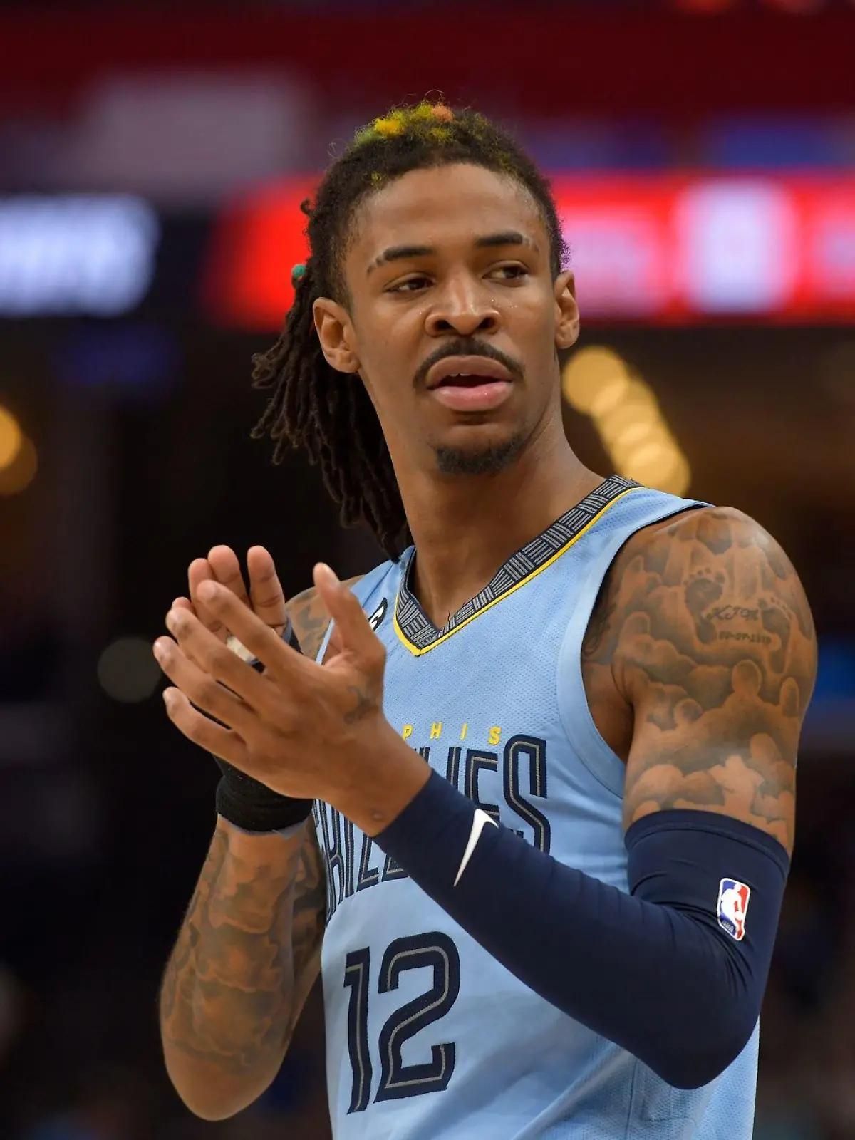 Memphis Grizzlies guard Ja Morant (12) plays during the second half of Game 5 in a first-round NBA basketball playoff series against the Los Angeles Lakers Wednesday, April 26, 2023, in Memphis, Tenn. (AP Photo/Brandon Dill)