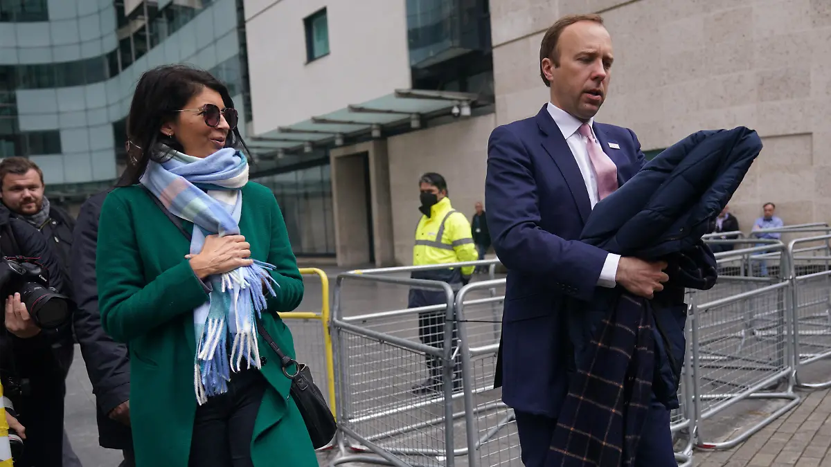 Matt Hancock affair accusations. Previously unissued photo dated 16/05/2021 of Health Secretary Matt Hancock with adviser Gina Coladangelo (left) outside BBC Broadcasting House in London after his appearance on the BBC1 current affairs programme, The Andrew Marr Show. Mr Hancock has been accused of having an affair with the adviser to his department. Issue date: Friday June 25, 2021. The Sun has published pictures of the married Cabinet minister appearing to kiss Gina Coladangelo, who the newspaper said was hired by Mr Hancock last year. See PA story POLITICS Hancock. Photo credit should read: Yui Mok/PA Wire URN:60564801