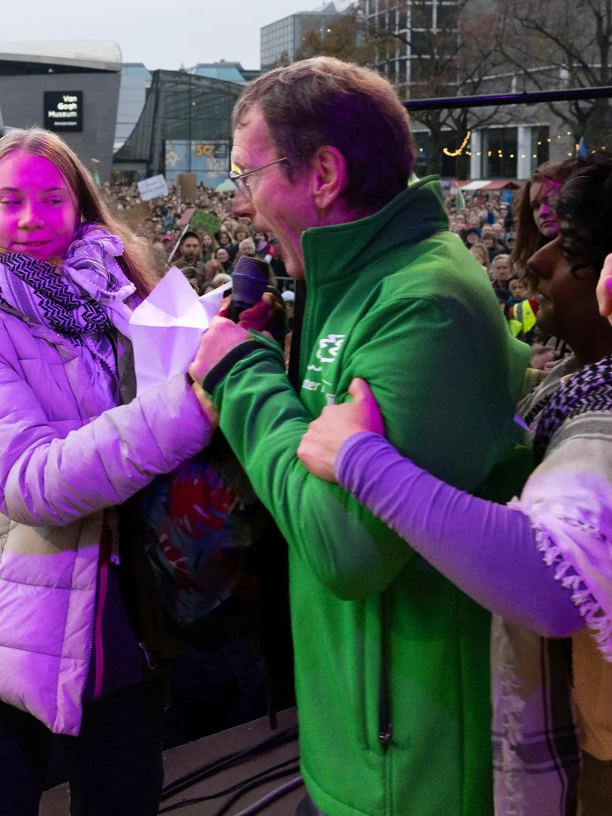 Climate activist Greta Thunberg is interrupted by a climate activist after Thunberg expressed solidarity with the Palestinians as tens of thousands of people marched through Amsterdam, Netherlands, Sunday, Nov. 12, 2023, to call for more action to tackle climate change. Thunberg was among the speakers at the march that comes 10 days before national elections in the Netherlands. (AP Photo/Peter Dejong)