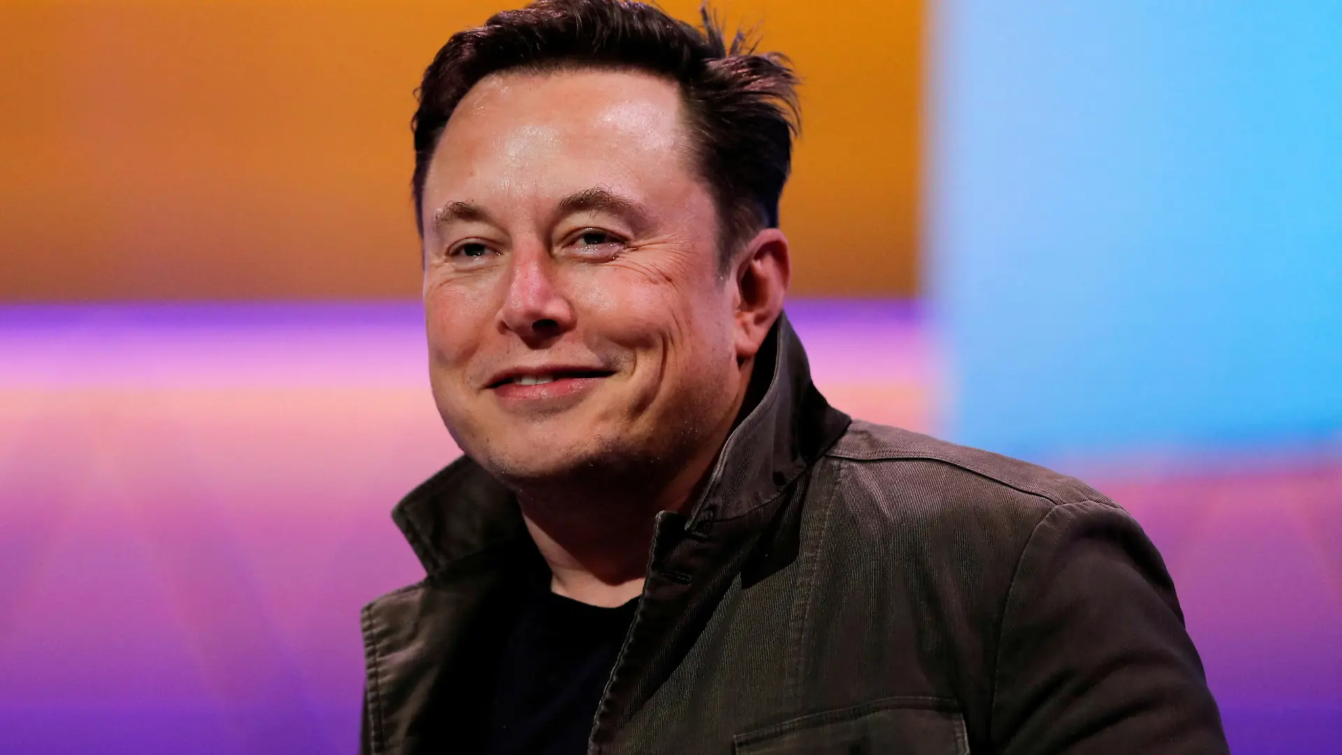 FILE PHOTO: SpaceX owner and Tesla CEO Elon Musk smiles at the E3 gaming convention in Los Angeles, California, U.S., June 13, 2019. REUTERS/Mike Blake/File Photo