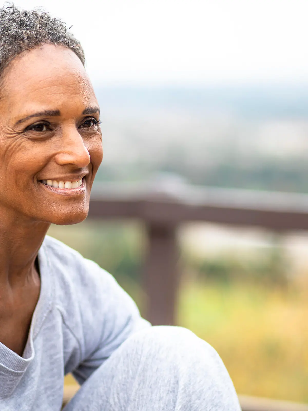A senior black woman staying fit outdoors