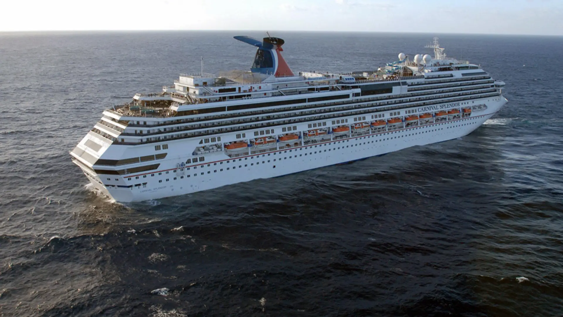 A photo released by the U.S. Navy Visual News Service (NVNS) on 09 November and taken from a helicopter of the USS Ronald Reagan (CVN 76) shows the cruise ship Carnival Splendor of the Carnioval Cruise Line off the coast of Mexico. At the request of the US Coast Guard, the USS Ronald Reagan was diverted and approaching the cruise liner to facilitate the delivery of needed supplies, the US Navy said. The cruise liner with 4,460 people on board is drifting in the Pacific Ocean some 150 nautical miles southwest of San Diego off the Mexican coast after a fire in its engine room on 08 November. EPA/Mass Communication Specialist 3rd Class Dylan McCord / HANDOUT MANDATORY CREDIT EDITORIAL USE ONLY +++(c) dpa - Bildfunk+++